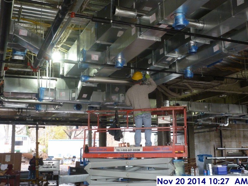 Installing ductwork fittings at the 1st floor Facing North